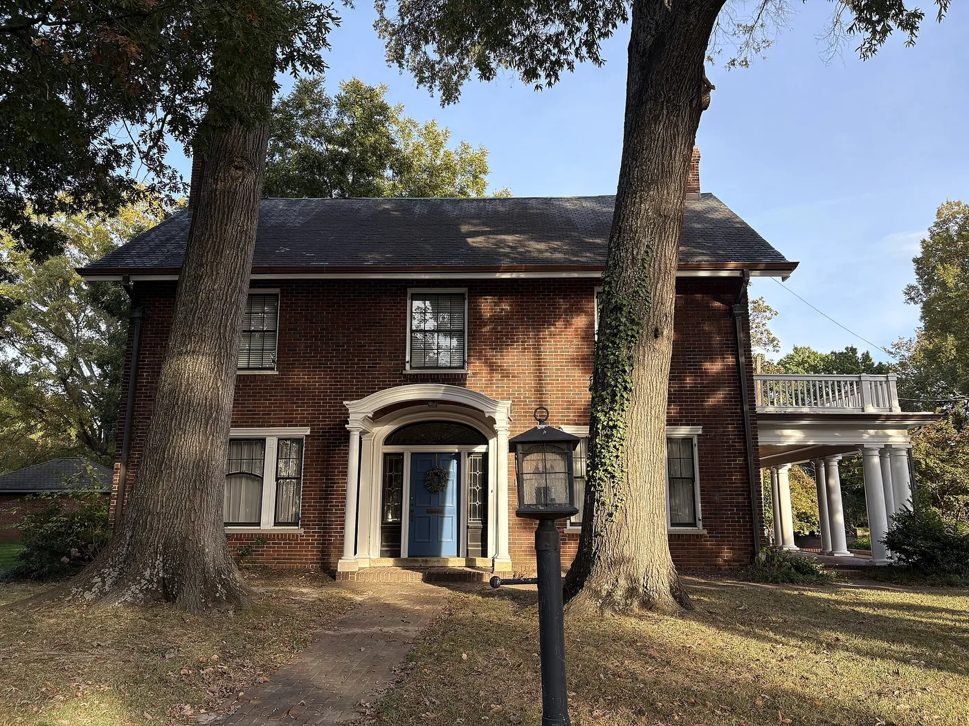 A tired house exterior before renovation